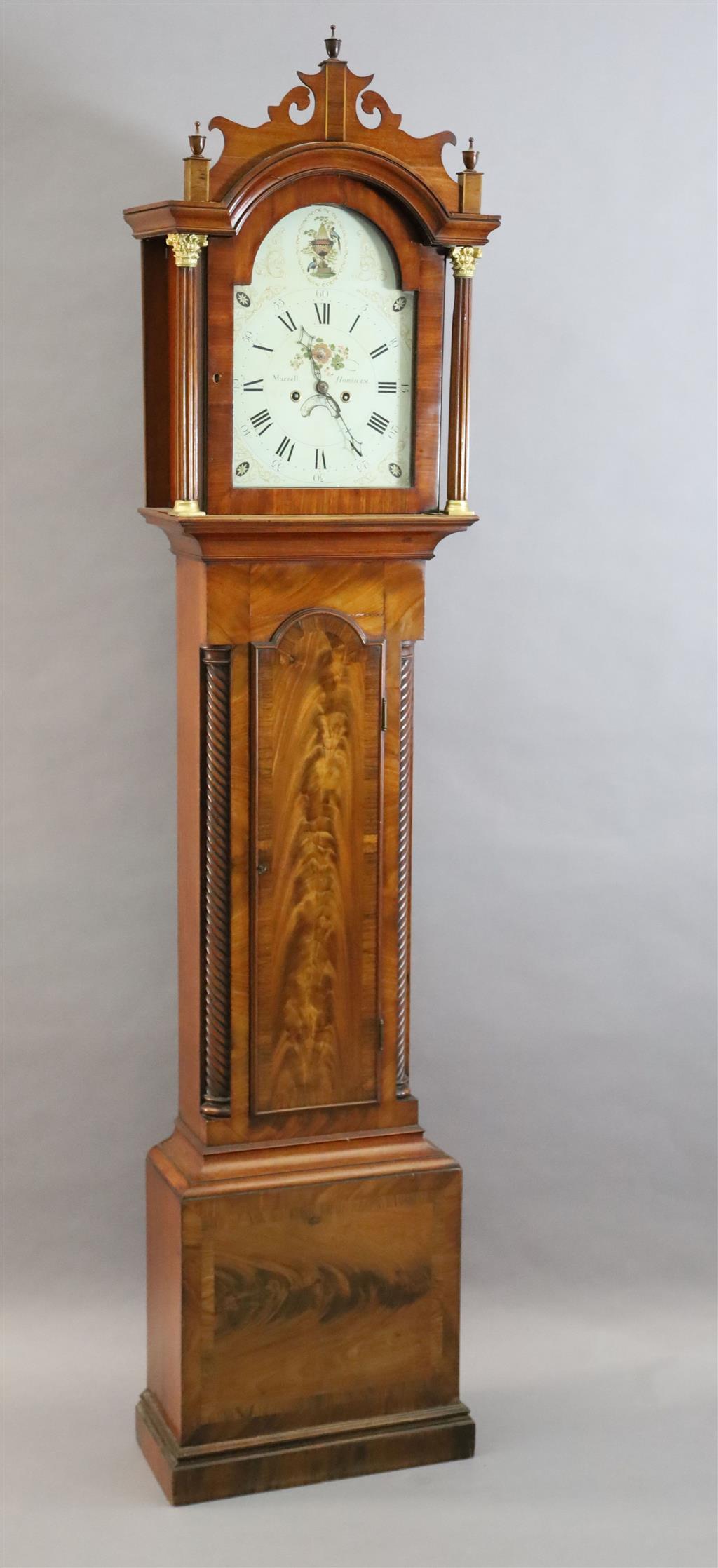 Muzzell of Horsham. An early 19th century mahogany eight day longcase clock, H.7ft 5in.